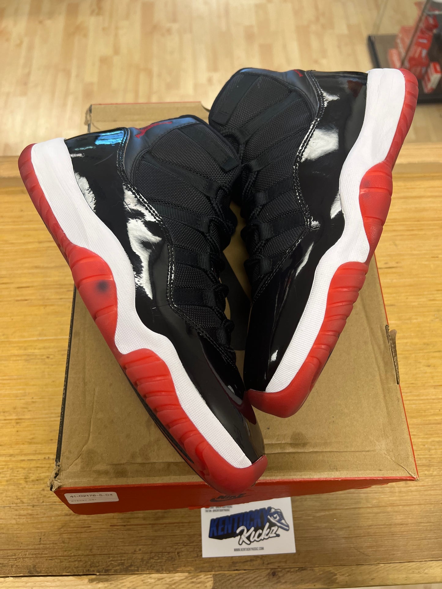 Jordan 11 Retro “Bred” (Sz 12)