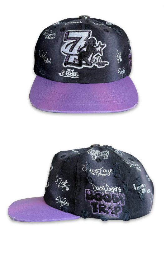 “TRIPLE SEVEN” TRAP SIGNED SNAPBACK (BLACK)